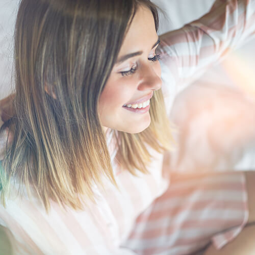 A woman in the morning waking with her circadian rhythm