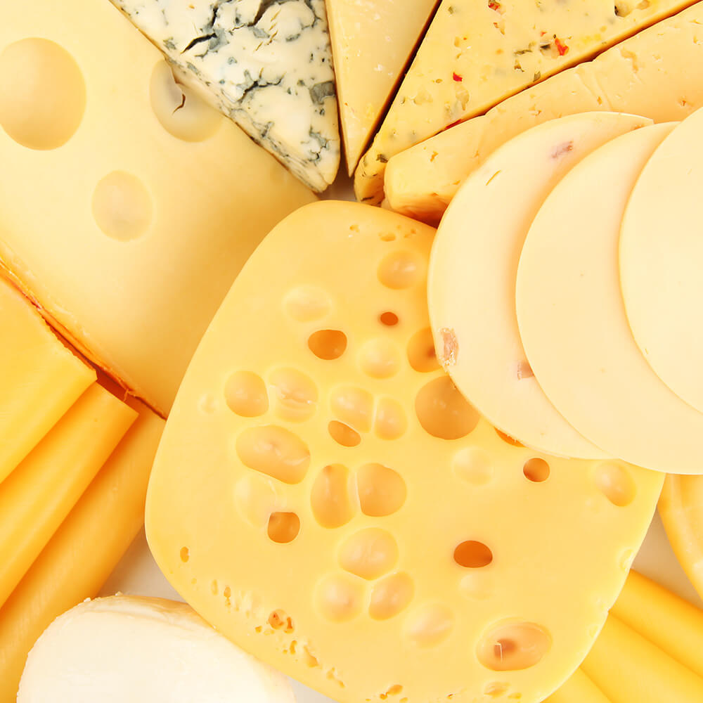 Variety of cheeses, one of the dietary factors possibly contributing to acne