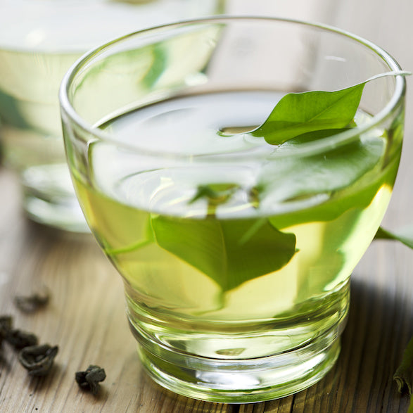 A cup of green tea which has skin health benefits