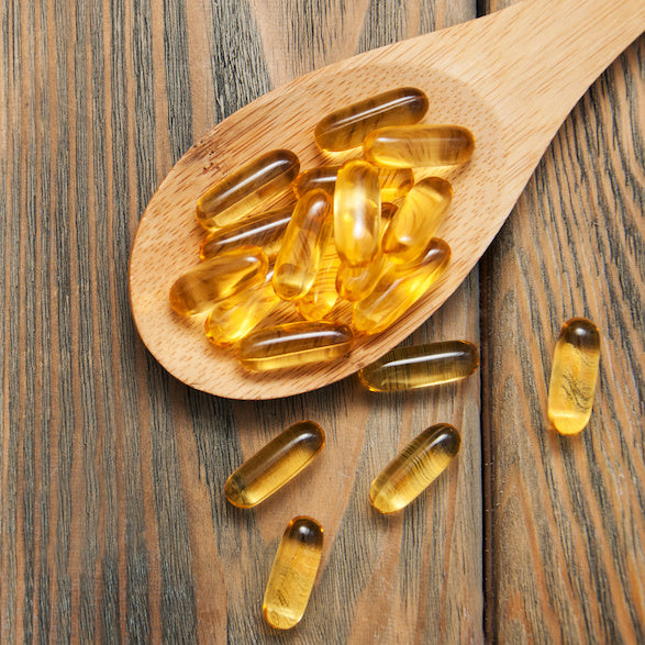 Capsules of vitamin E, which can also be used in skincare to address acne and skin aging
