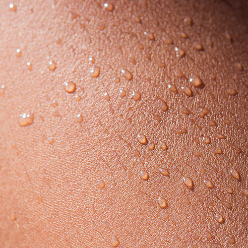 Water droplets on the surface of skin that don't penetrate the skin barrier