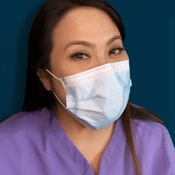 Dr. Sandra Lee aka Dr. Pimple Popper wearing a mask treated with Salicylic Acid Body Spray for maskne prevention
